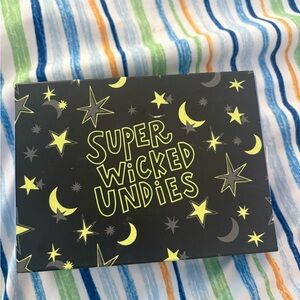 American Eagle Outfitters Black Thong Box with Yellow Star Design